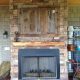 Outdoor fireplace on newly added on porch