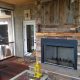 Outdoor fireplace on newly added on porch